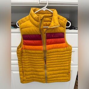 cotopaxi Yellow Quilted Puffer Vest with Red and Orange Chest Stripes
